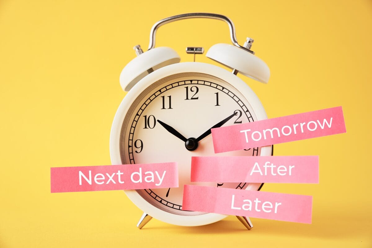 clock with labels like 'next day' and 'later', symbolizing procrastination and how to beat it