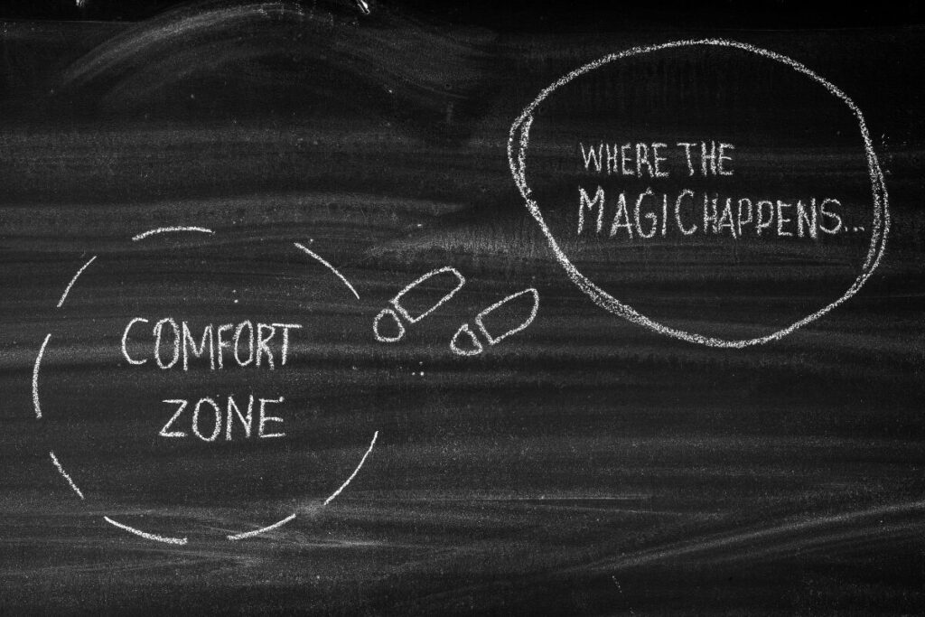 illustration showing comfort zone and footsteps leading to 'where the magic happens', symbolizing stepping out of your comfort zone