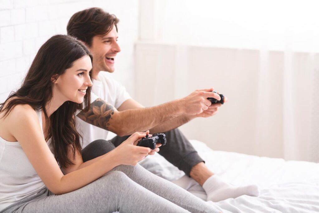 winter date night ideas  - couple playing video games 