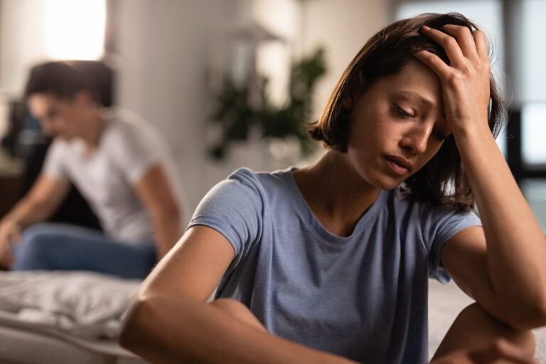 Woman sitting alone feeling unappreciated and taken for granted in her relationship