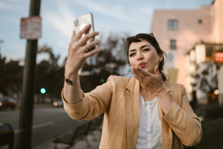Woman writing a heartfelt letter to her partner, expressing love through words—one of the beautiful long-distance relationship quotes for him that bridge the distance.