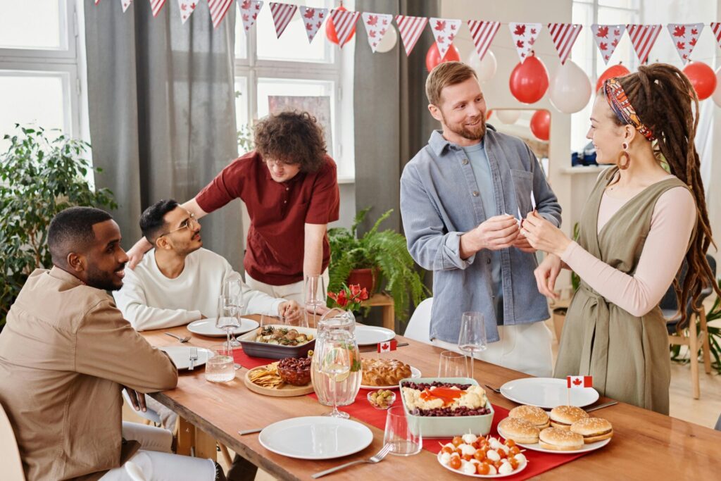 Group of people at a family birthday gathering, where common signs you're a people pleaser often appear in social interactions.