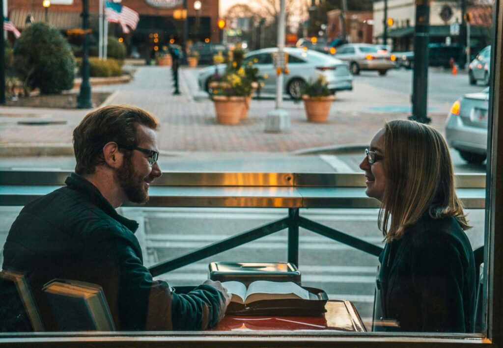 Man and woman happily talking in a café, demonstrating healthy communication to stop taking everything personally in your relationship.











Select 74 more words to run Humanizer.

