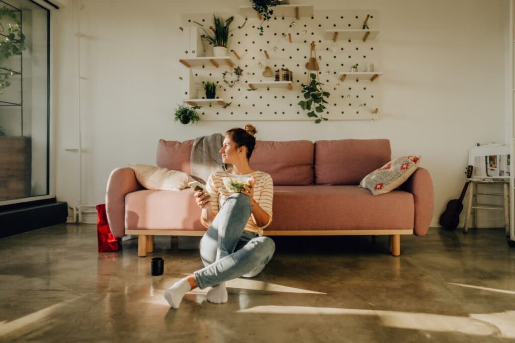 signs you're running from your past - woman thinking about past 